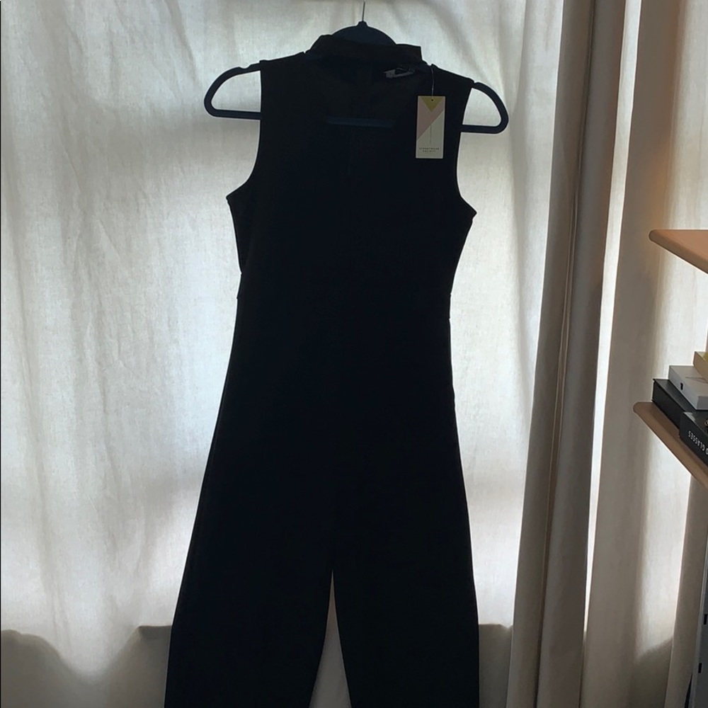 SOLD- Black plunge neck 3/4 length wide leg jumpsuit